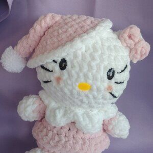 Pink and White Stuffed Animal Toy